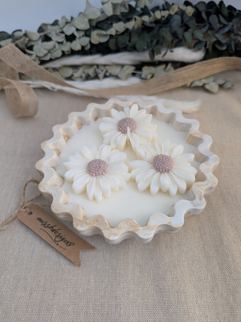 Daisy scented candle made from jesmonite eco resin filled with scented soy wax hand cast stone pot natural beige marble three daisies