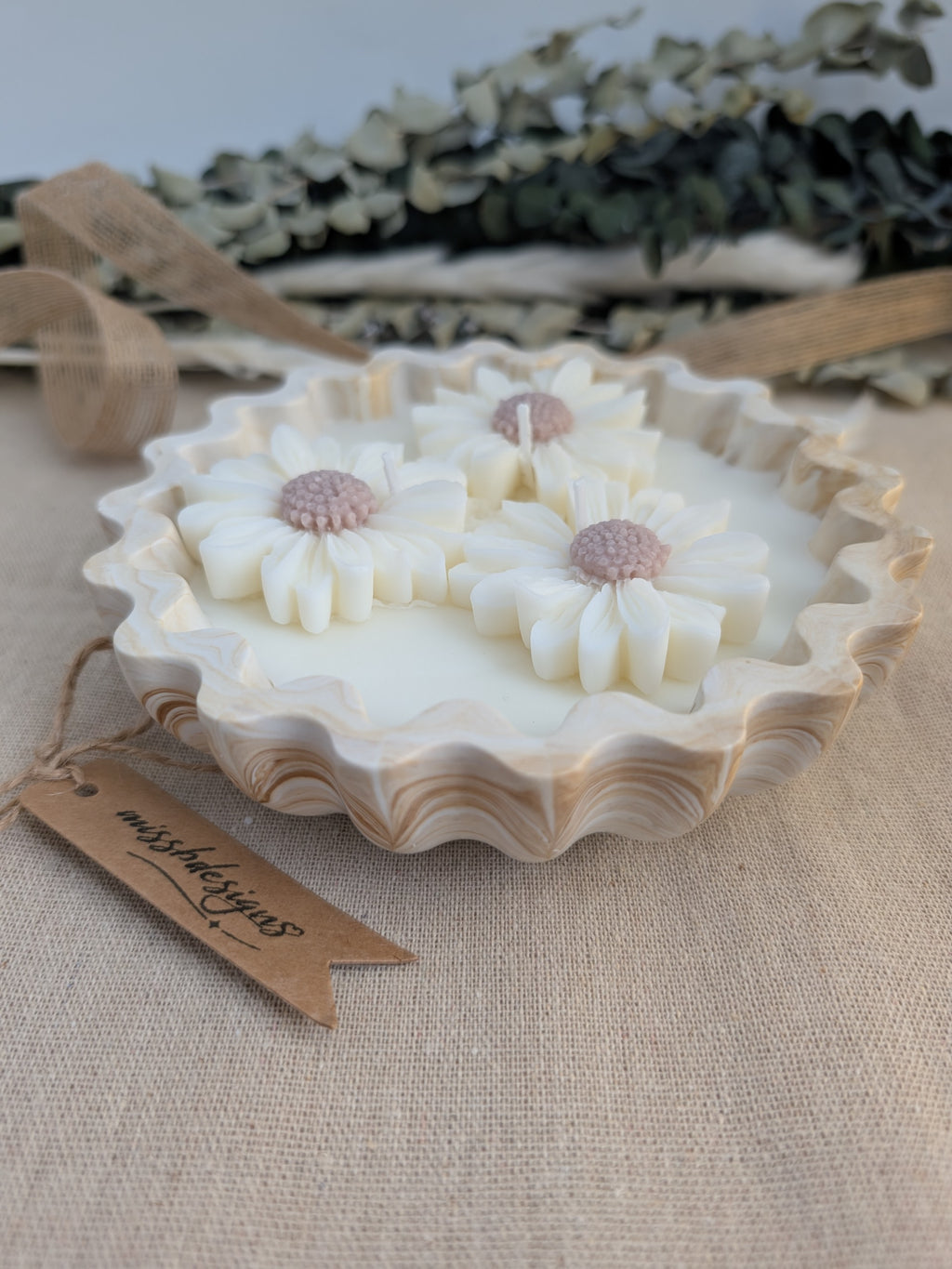 Daisy scented candle made from jesmonite eco resin filled with scented soy wax hand cast stone pot natural beige marble three daisies