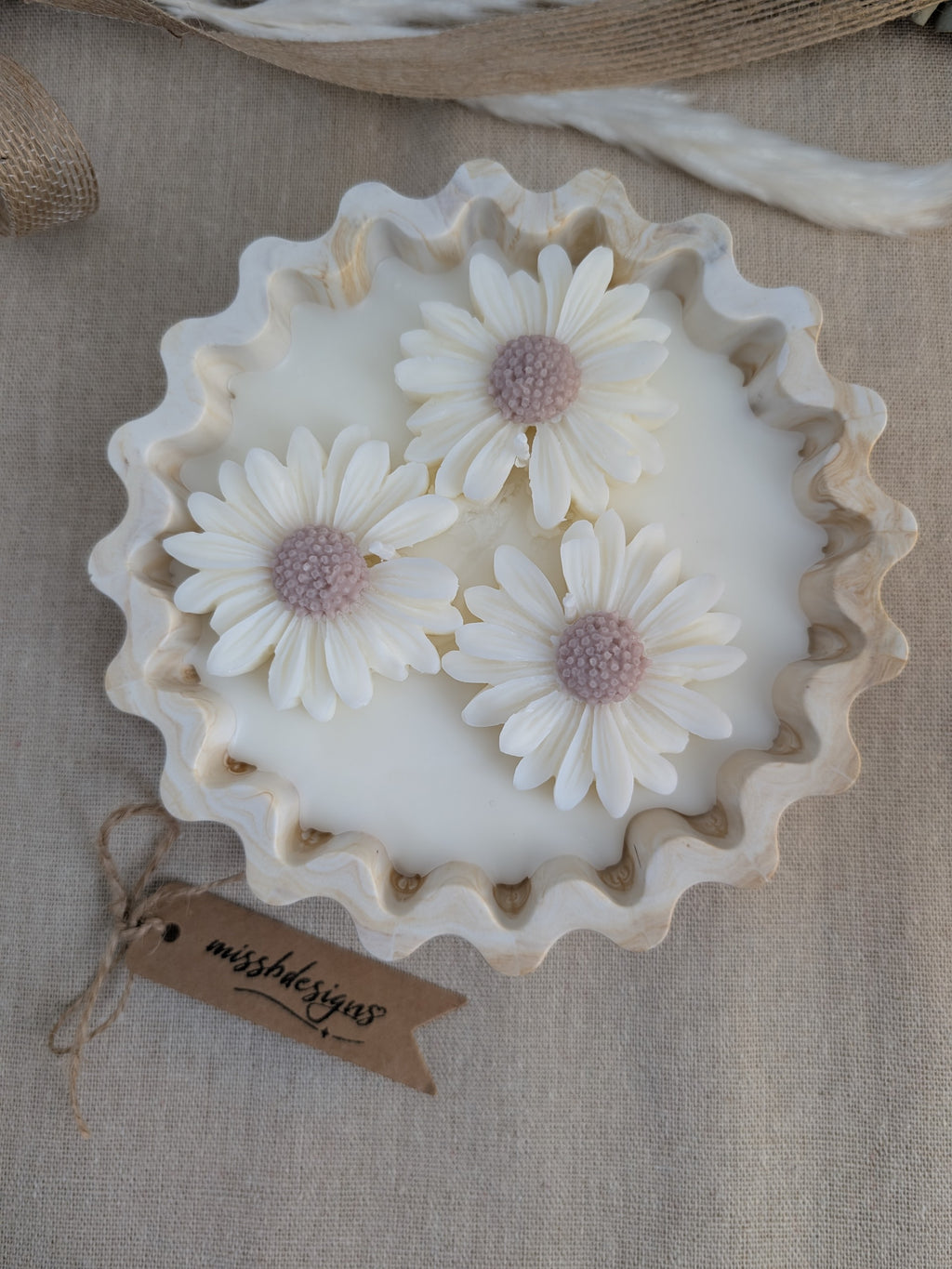 Daisy scented candle made from jesmonite eco resin filled with scented soy wax hand cast stone pot natural beige marble three daisies