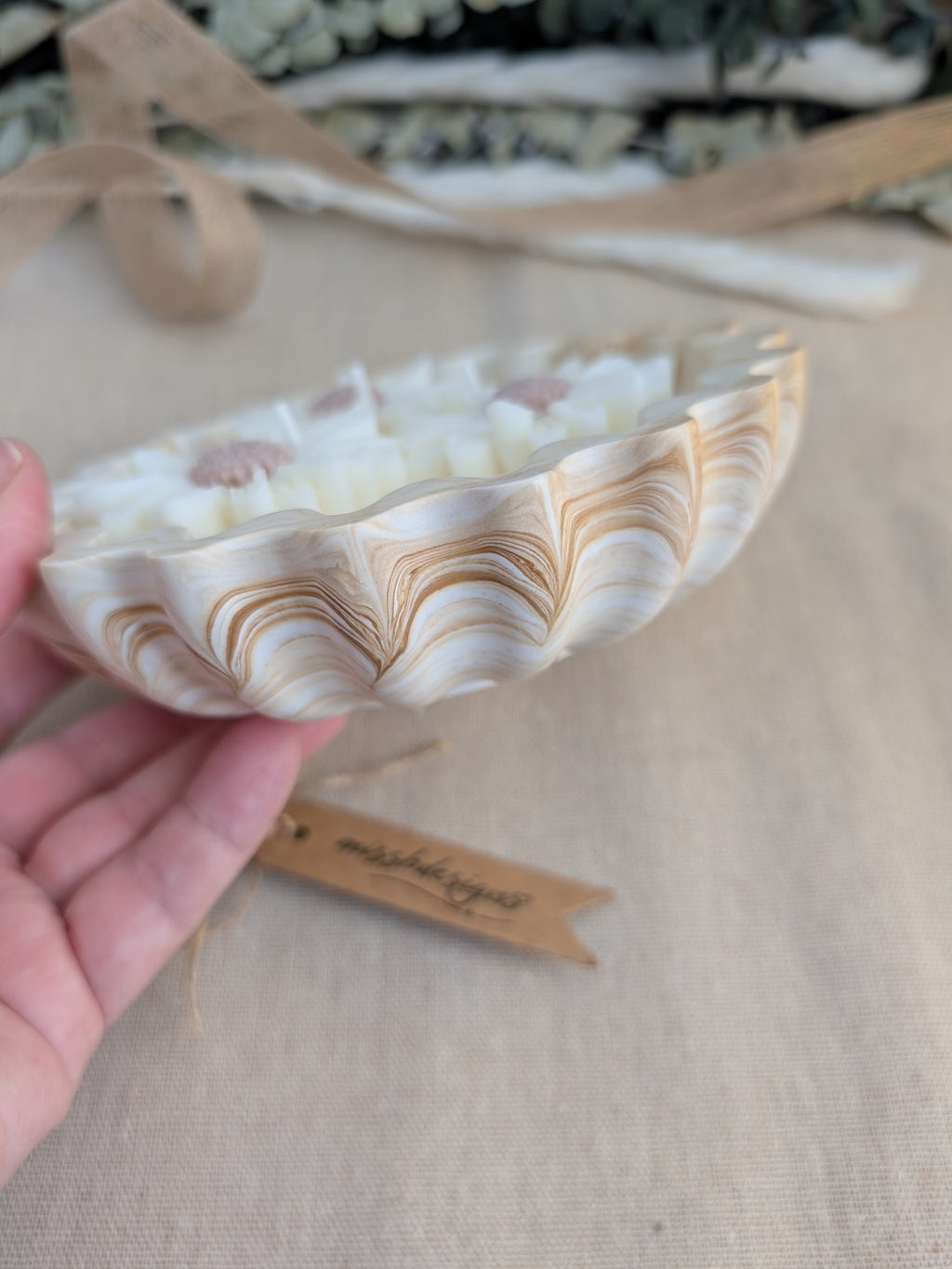 Daisy scented candle made from jesmonite eco resin filled with scented soy wax hand cast stone pot natural beige marble three daisies
