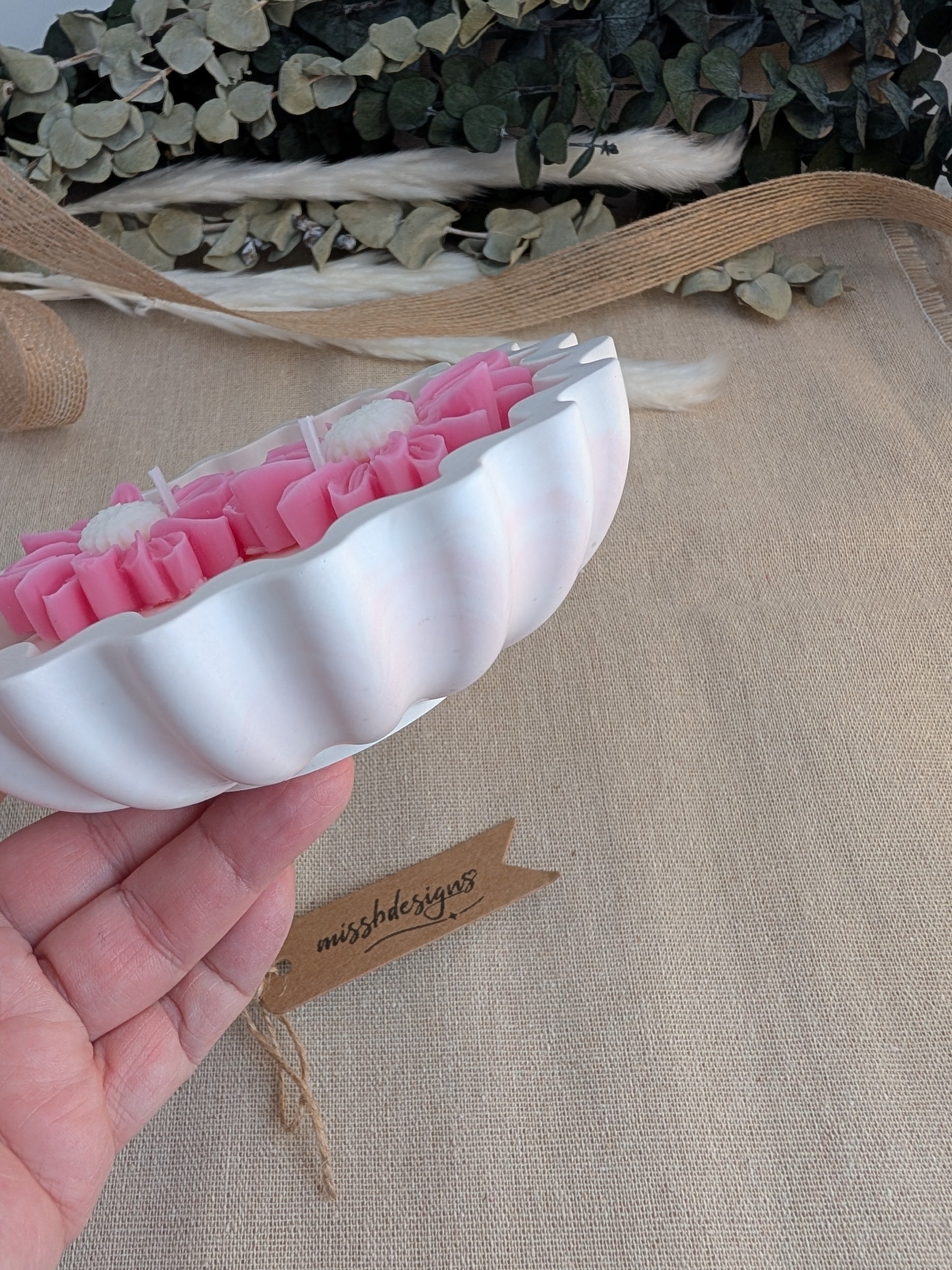 Daisy scented candle made from jesmonite eco resin filled with scented soy wax hand cast stone pot pink marble two daisies