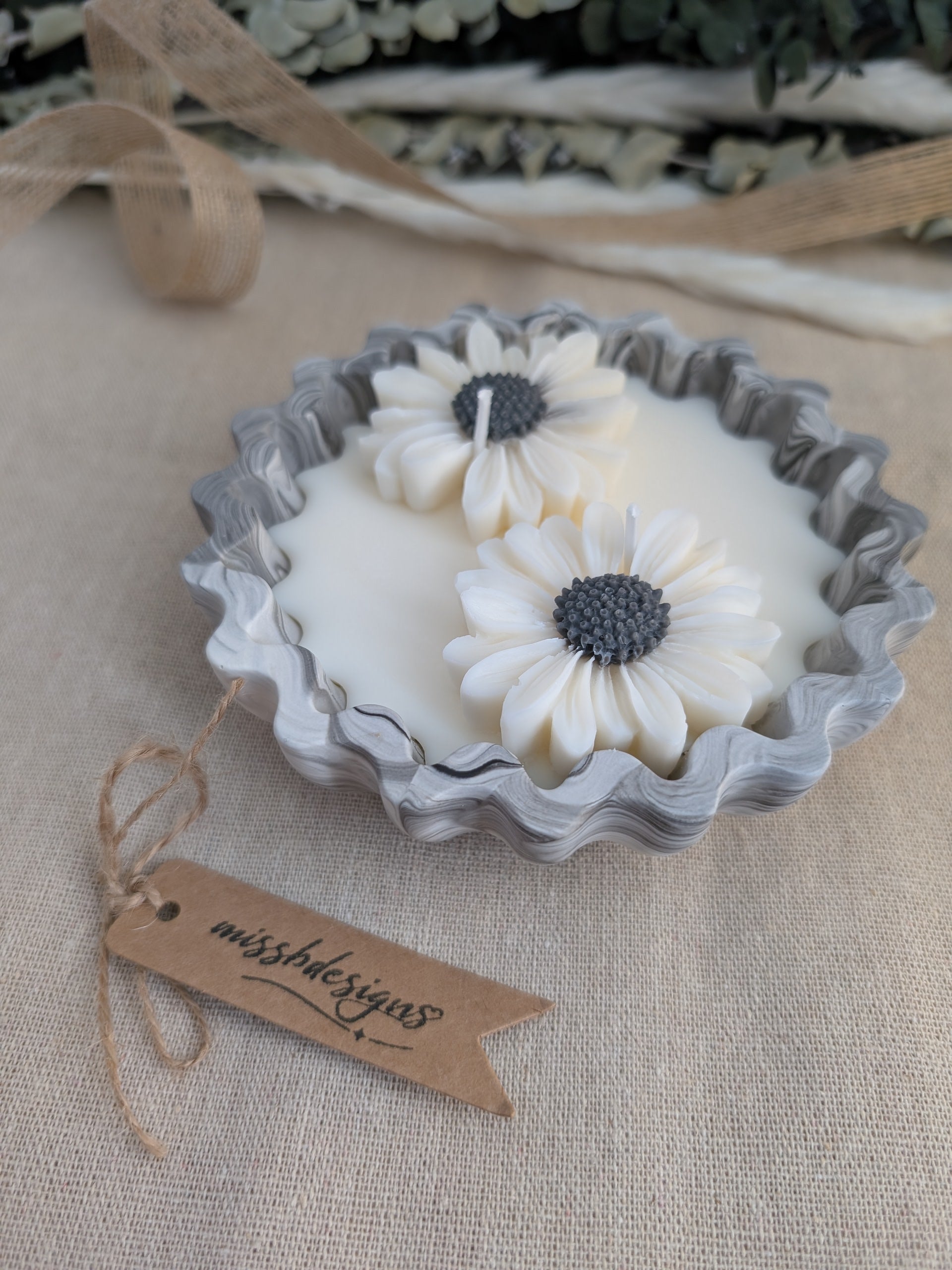 Daisy scented candle made from jesmonite eco resin filled with scented soy wax hand cast stone pot black marble two daisies