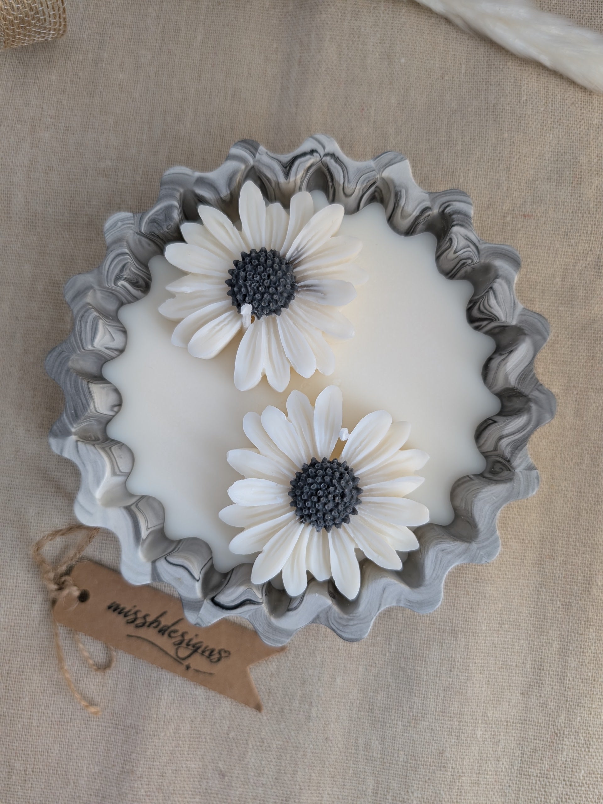 Daisy scented candle made from jesmonite eco resin filled with scented soy wax hand cast stone pot black marble two daisies