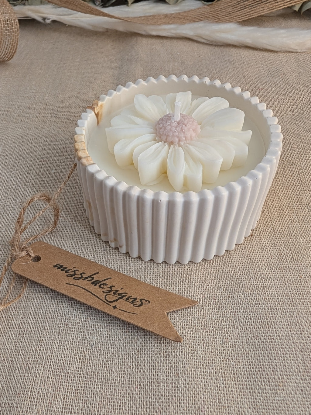 Daisy scented candle made from jesmonite eco resin filled with scented soy wax hand cast stone pot natural marble