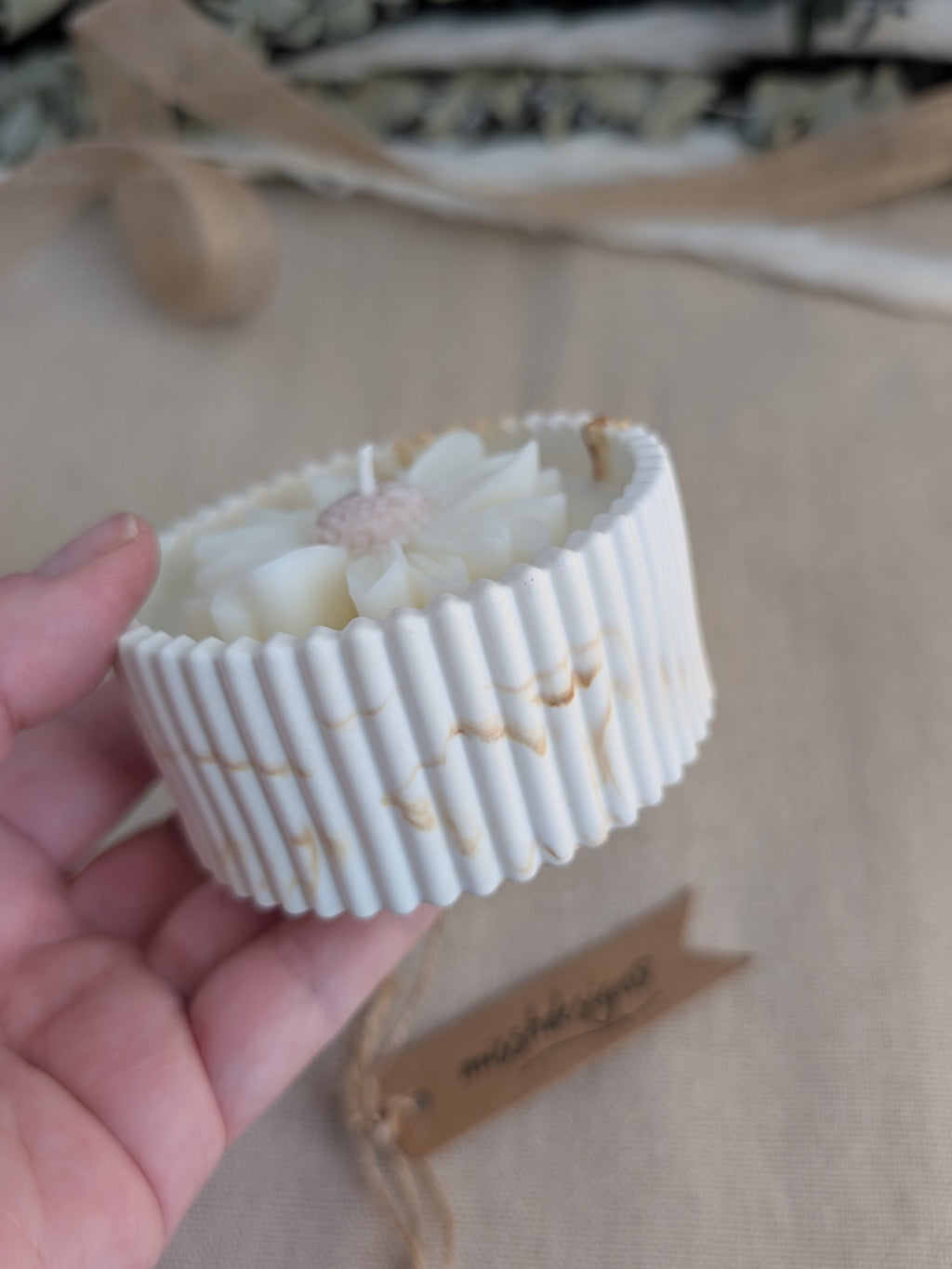 Daisy scented candle made from jesmonite eco resin filled with scented soy wax hand cast stone pot natural marble