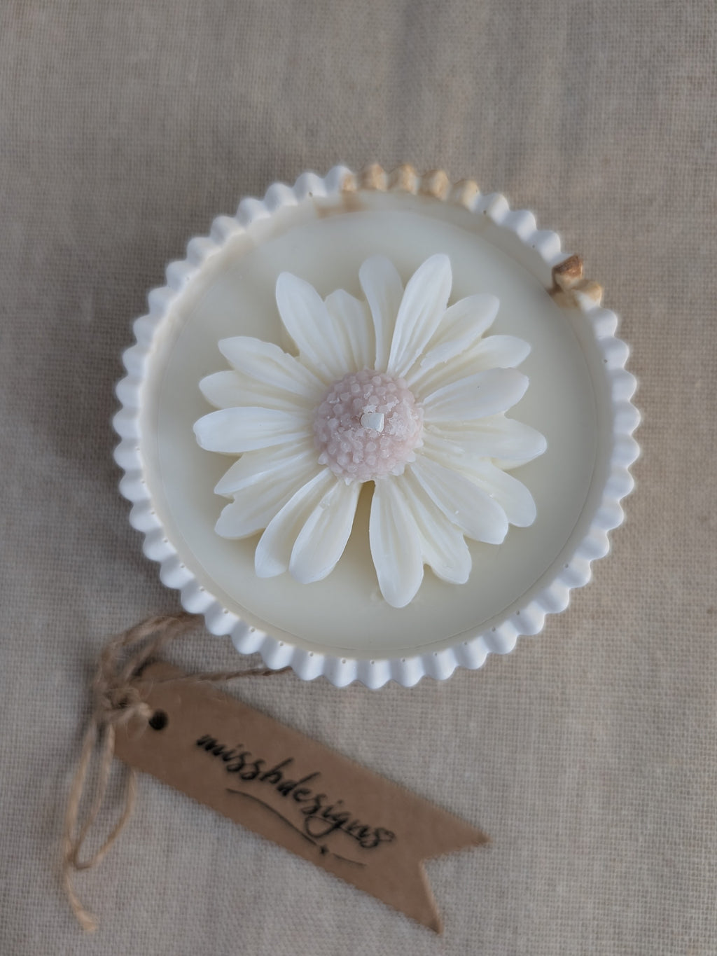 Daisy scented candle made from jesmonite eco resin filled with scented soy wax hand cast stone pot natural marble