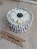 Daisy scented candle made from jesmonite eco resin filled with scented soy wax hand cast stone pot black marble