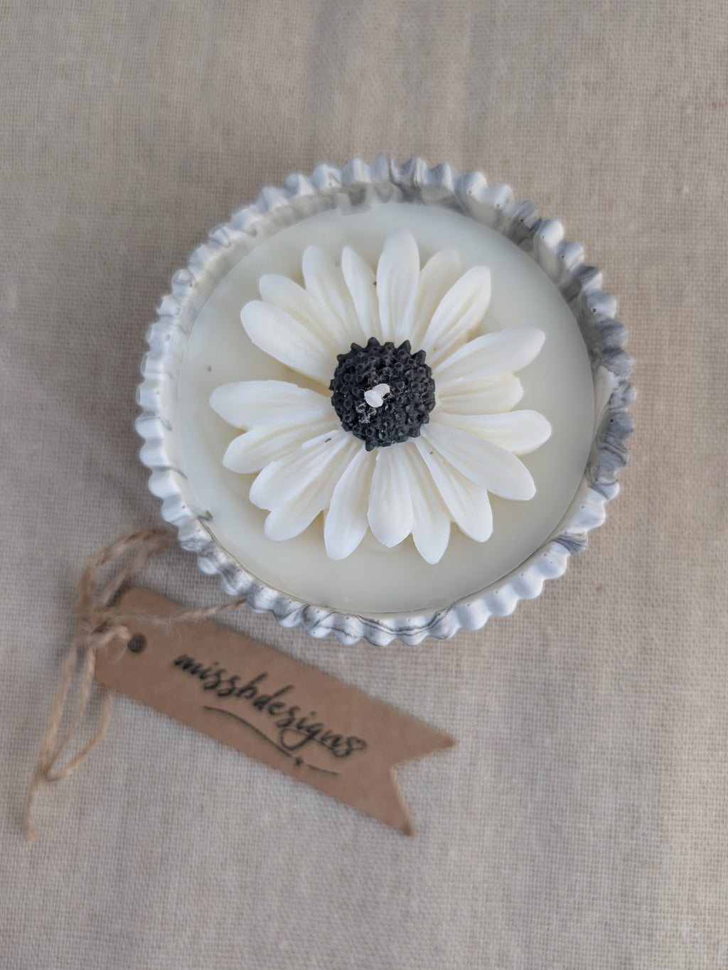 Daisy scented candle made from jesmonite eco resin filled with scented soy wax hand cast stone pot natural marble