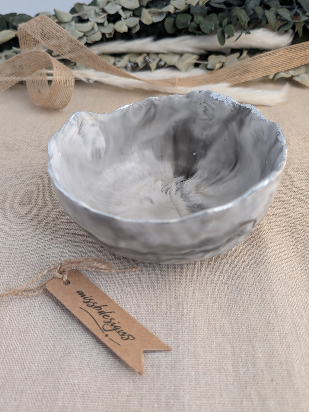Trinket bowl black marbled hand crafted jesmonite with silver foil trimmed edge 