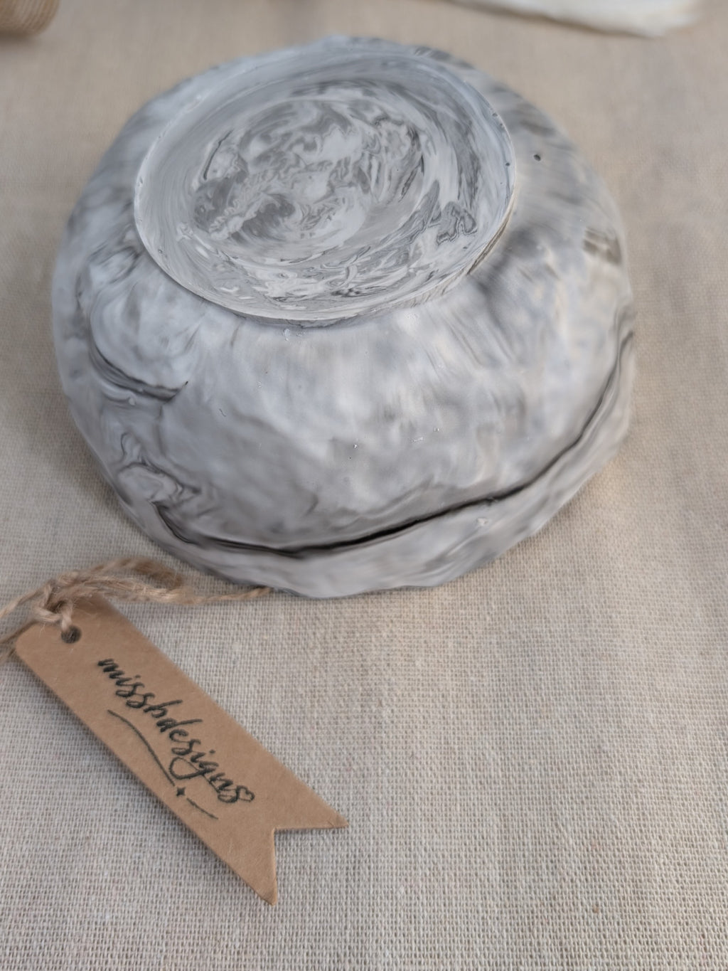 Trinket bowl black marbled hand crafted jesmonite with silver foil trimmed edge handcrafted