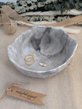 Trinket bowl black marbled hand crafted jesmonite with silver foil trimmed edge 