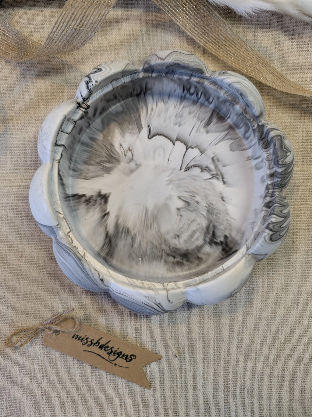 Flower Trinket bowl for home decor made of eco resin jesmonite with a black marbled effect 