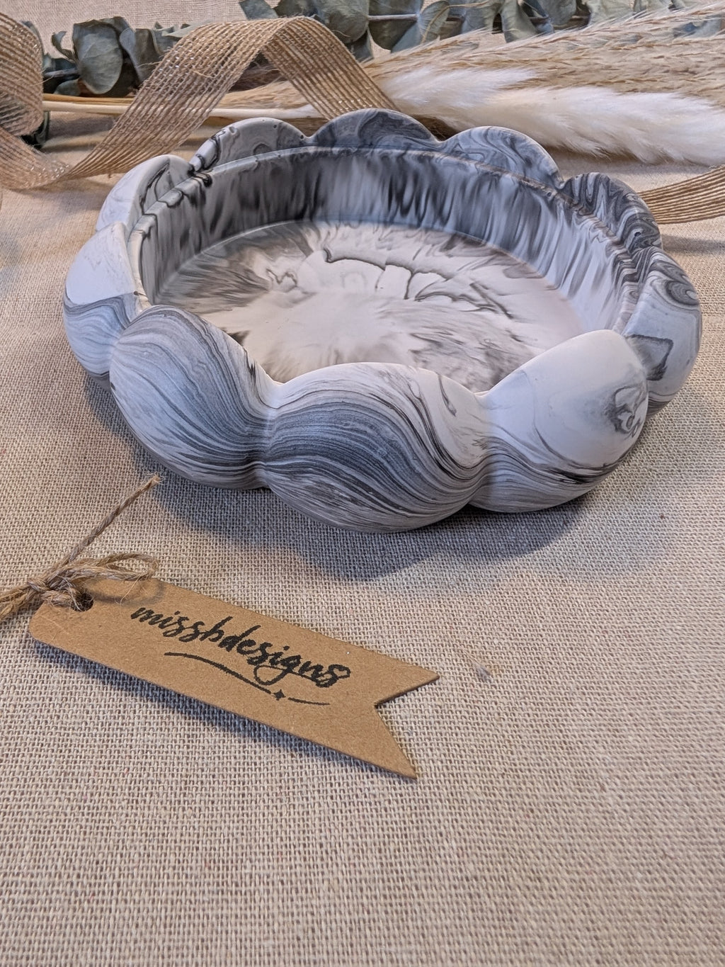Flower Trinket bowl for home decor made of eco resin jesmonite with a black marbled effect 