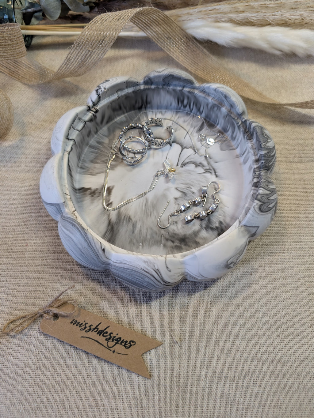 Flower Trinket bowl for home decor made of eco resin jesmonite with a black marbled effect 