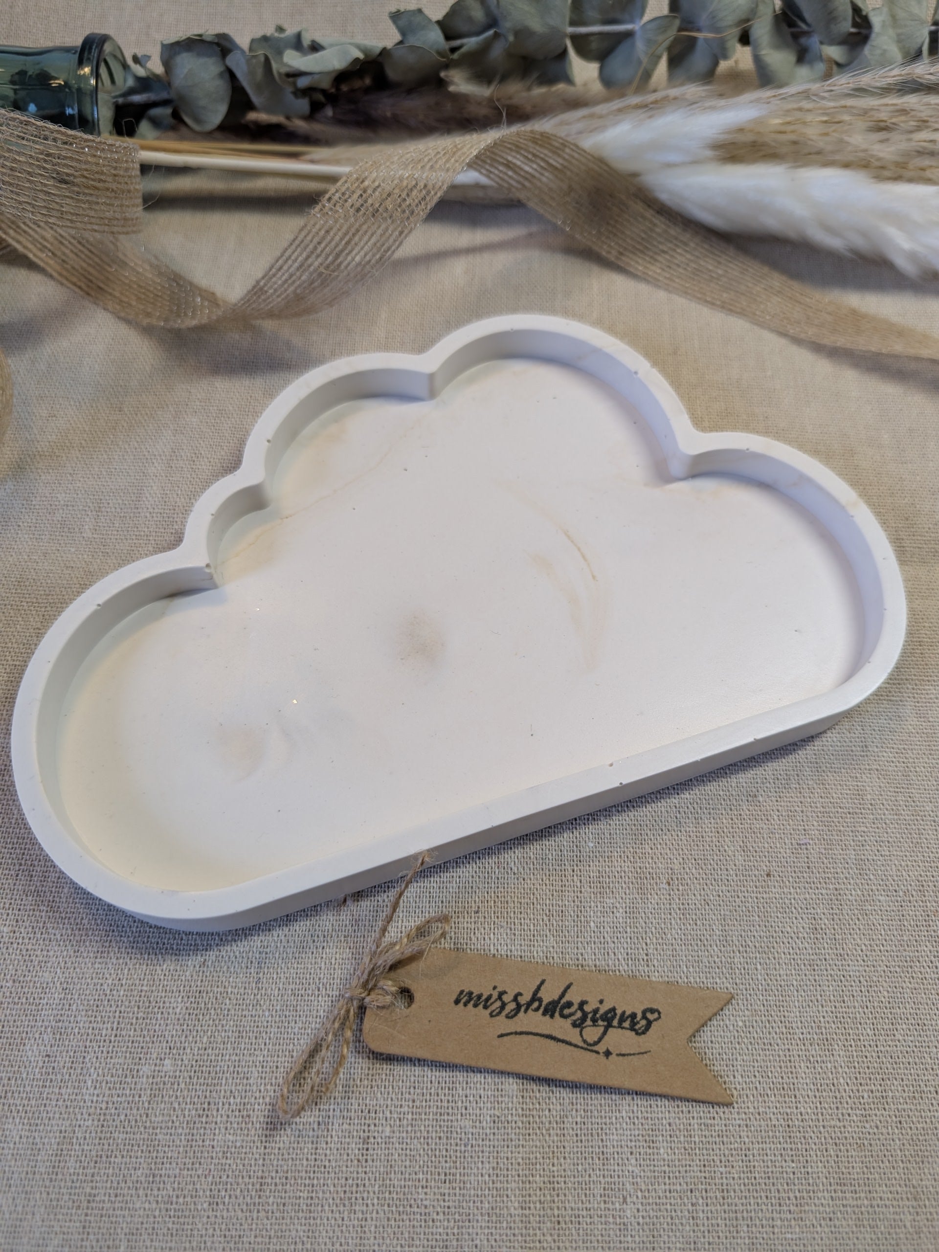 Cloud shaped Trinket Tray for rings and jewellery made from eco rein jesmonite in neutral beige marbled design for interior decoration 