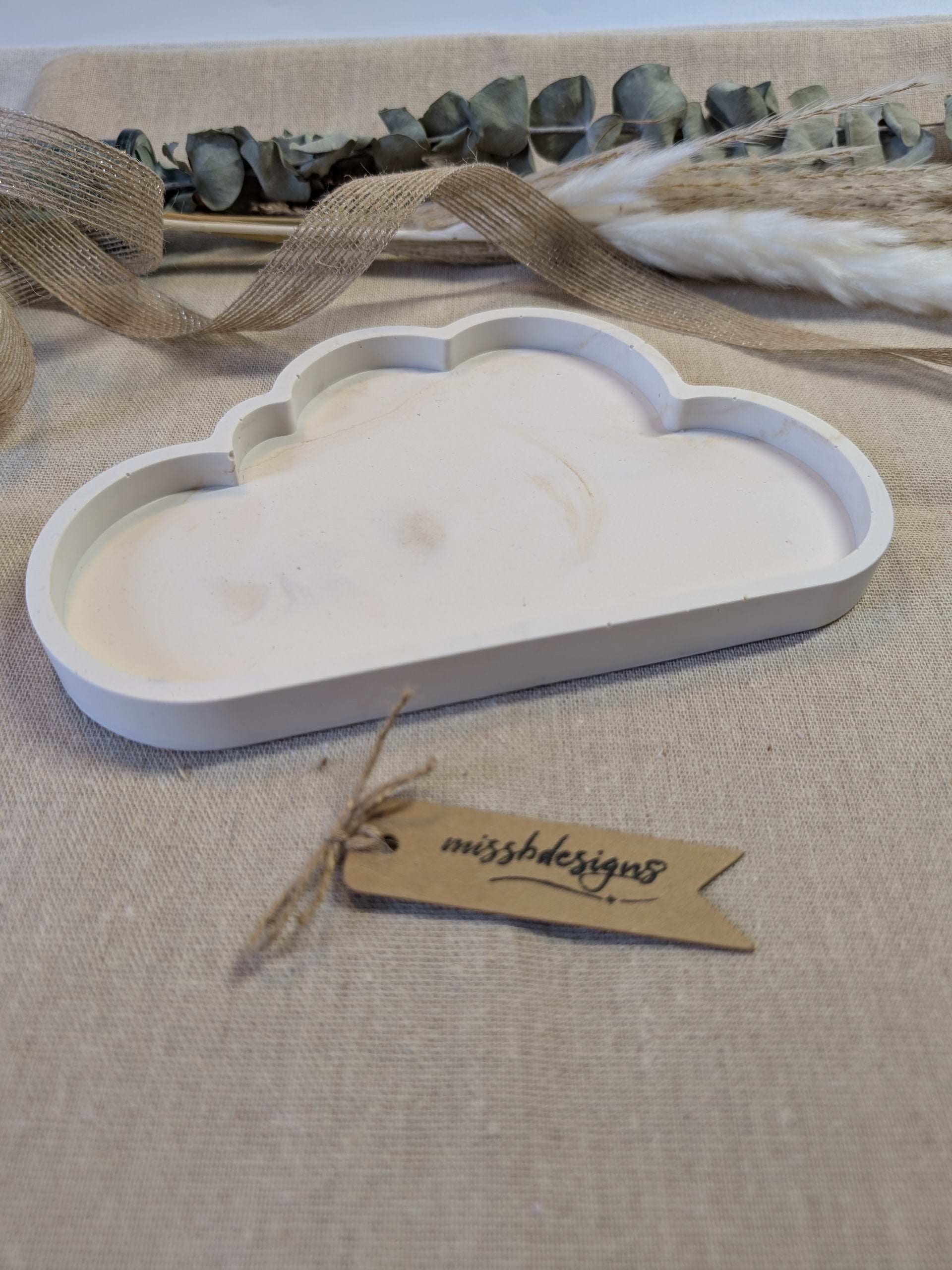 Cloud shaped Trinket Tray for rings and jewellery made from eco rein jesmonite in neutral beige marbled design for interior decoration 