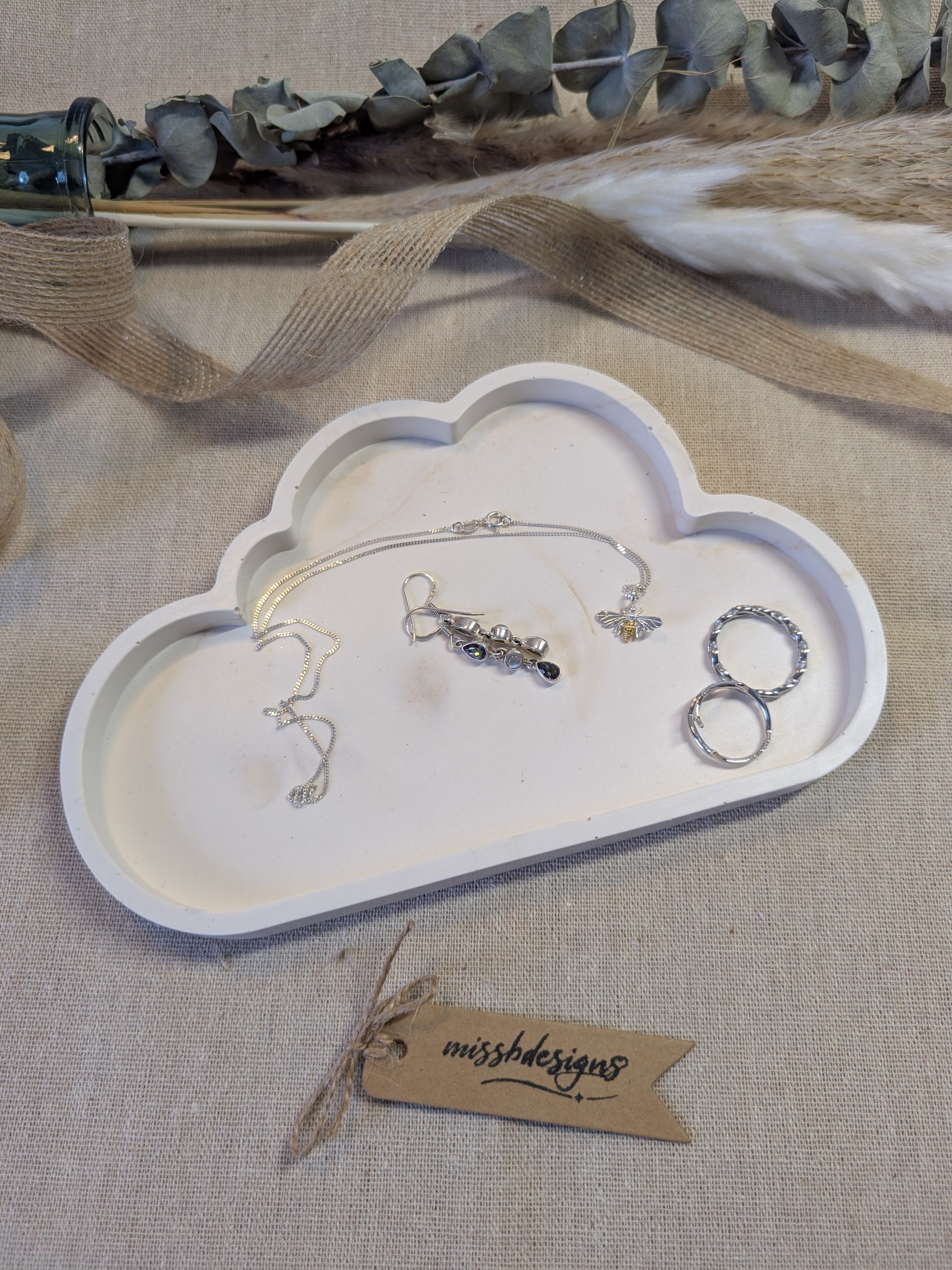 Cloud shaped Trinket Tray for rings and jewellery made from eco rein jesmonite in neutral beige marbled design for interior decoration 