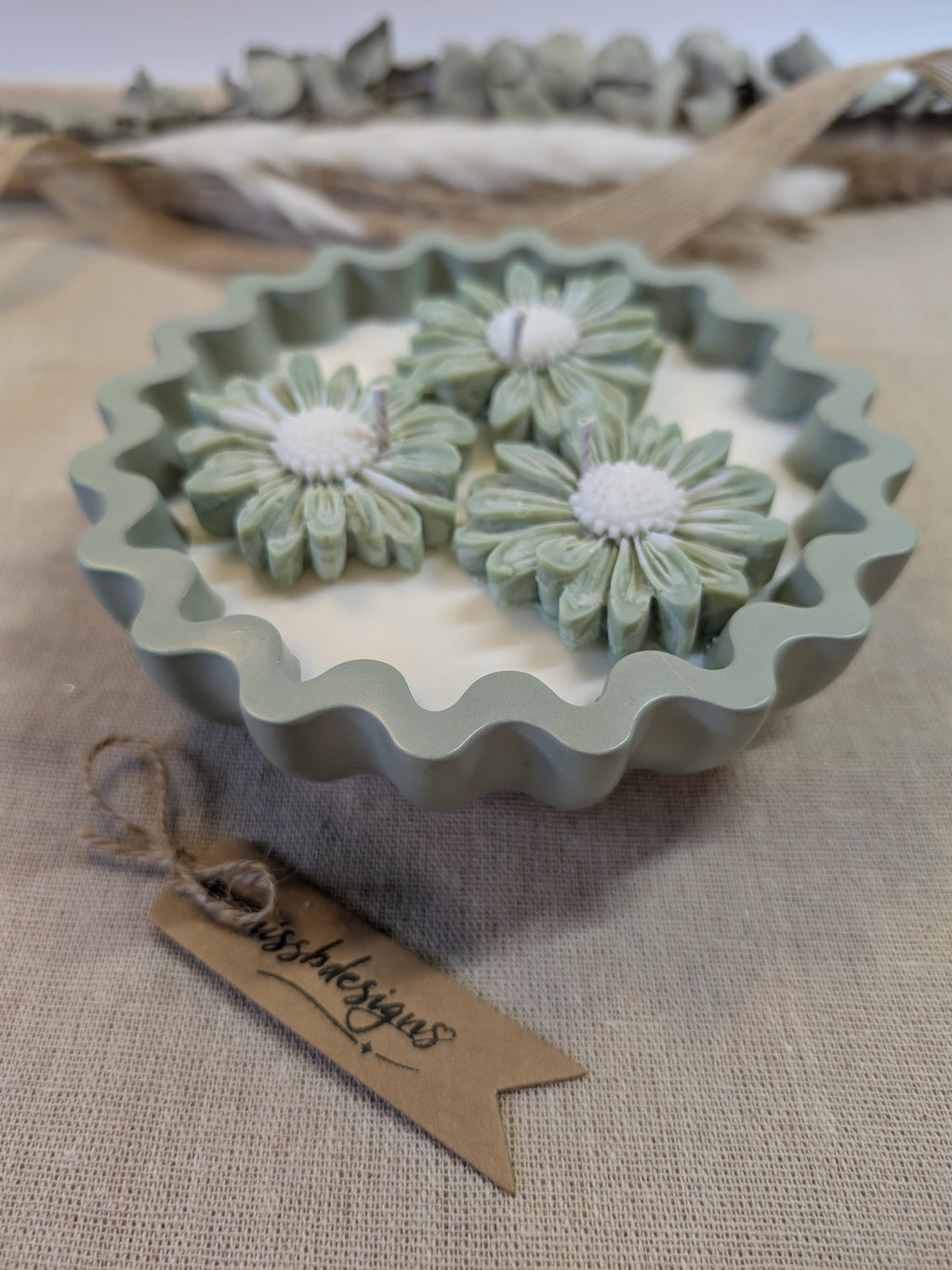 Natural sage green triple daisy candles in neutral green hand cast eco resin home decor pot scented with vanilla perfect gift