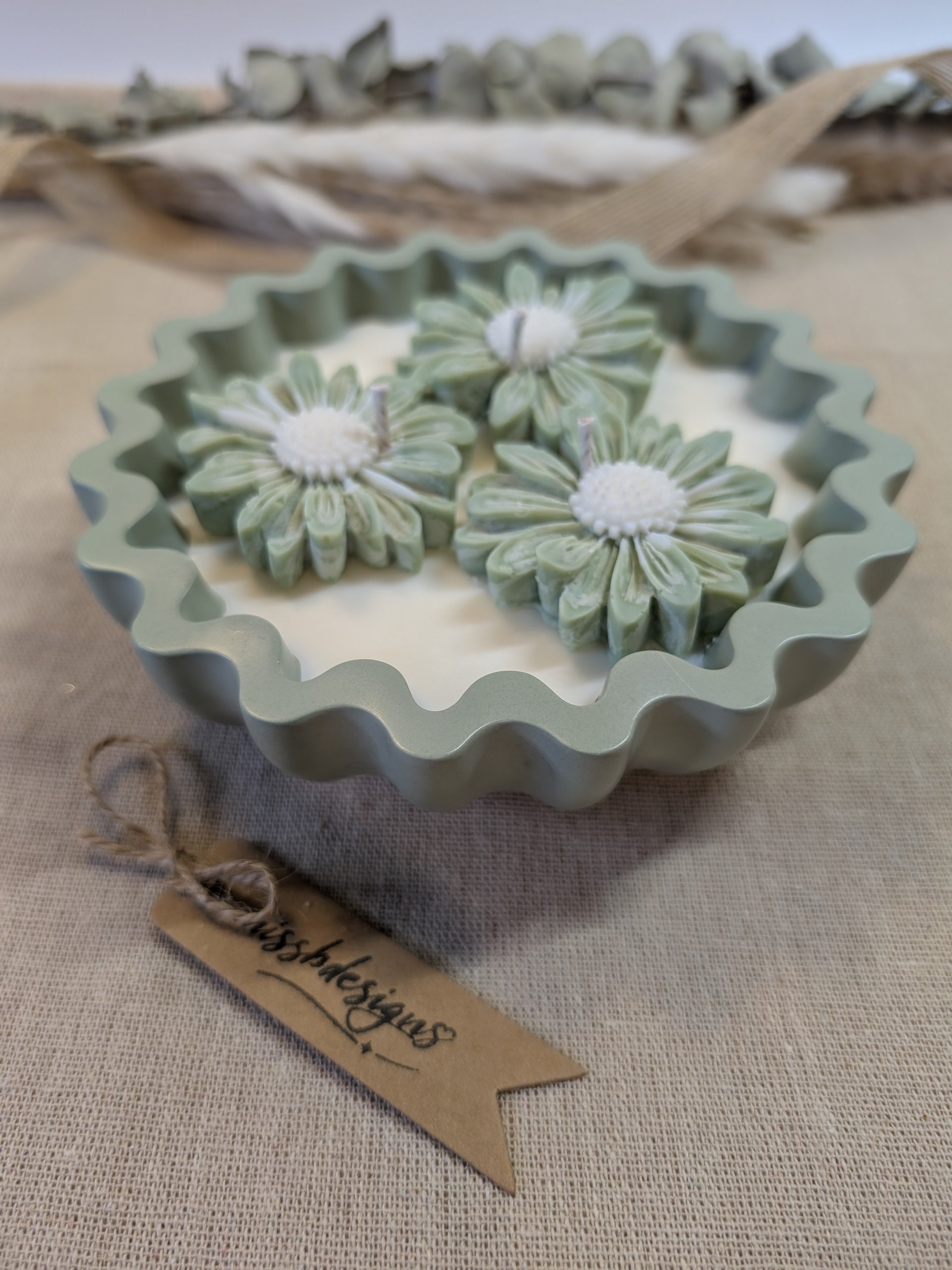 Natural sage green triple daisy candles in neutral green hand cast eco resin home decor pot scented with vanilla perfect gift