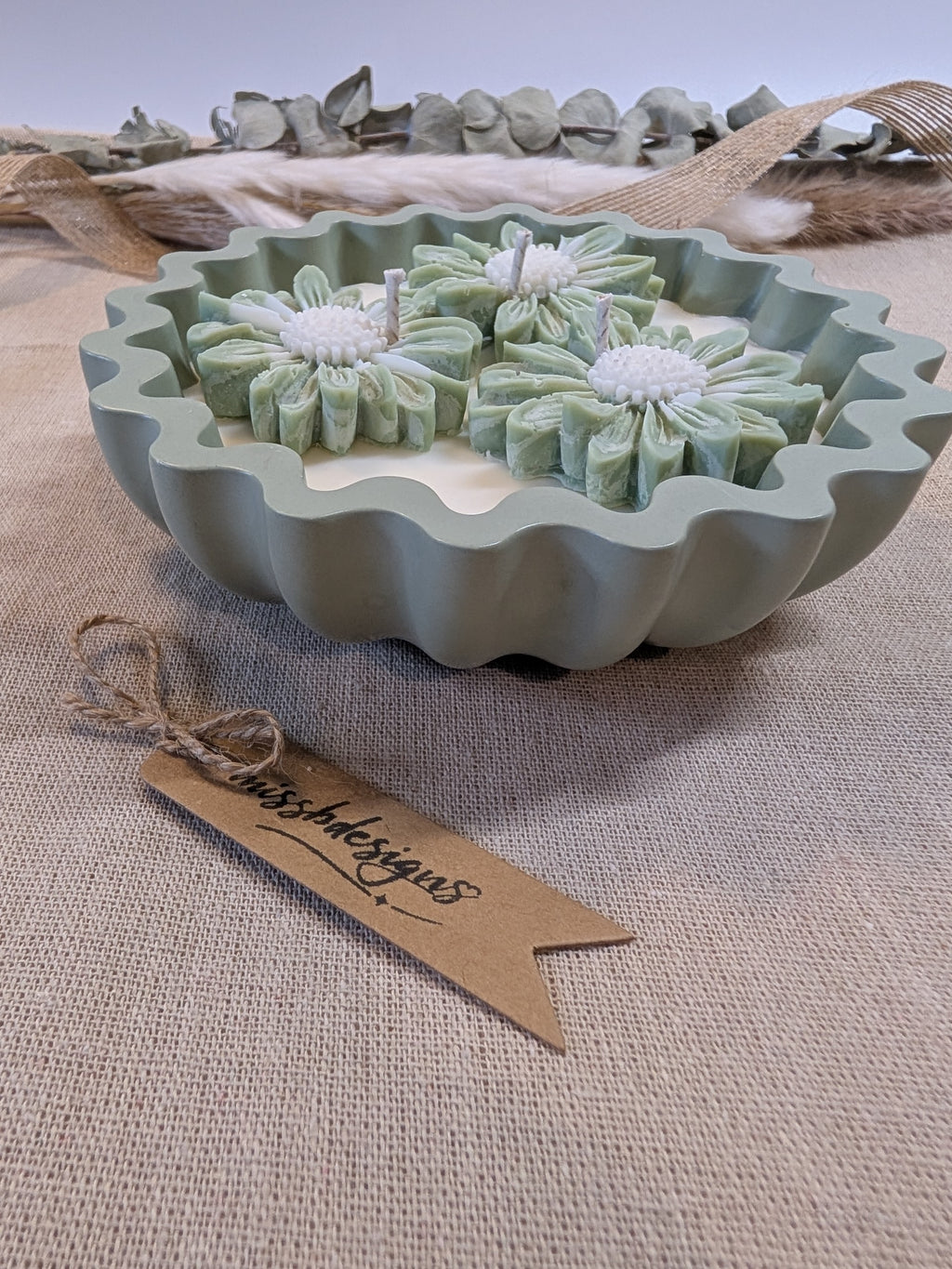 Natural sage green triple daisy candles in neutral green hand cast eco resin home decor pot scented with vanilla perfect gift