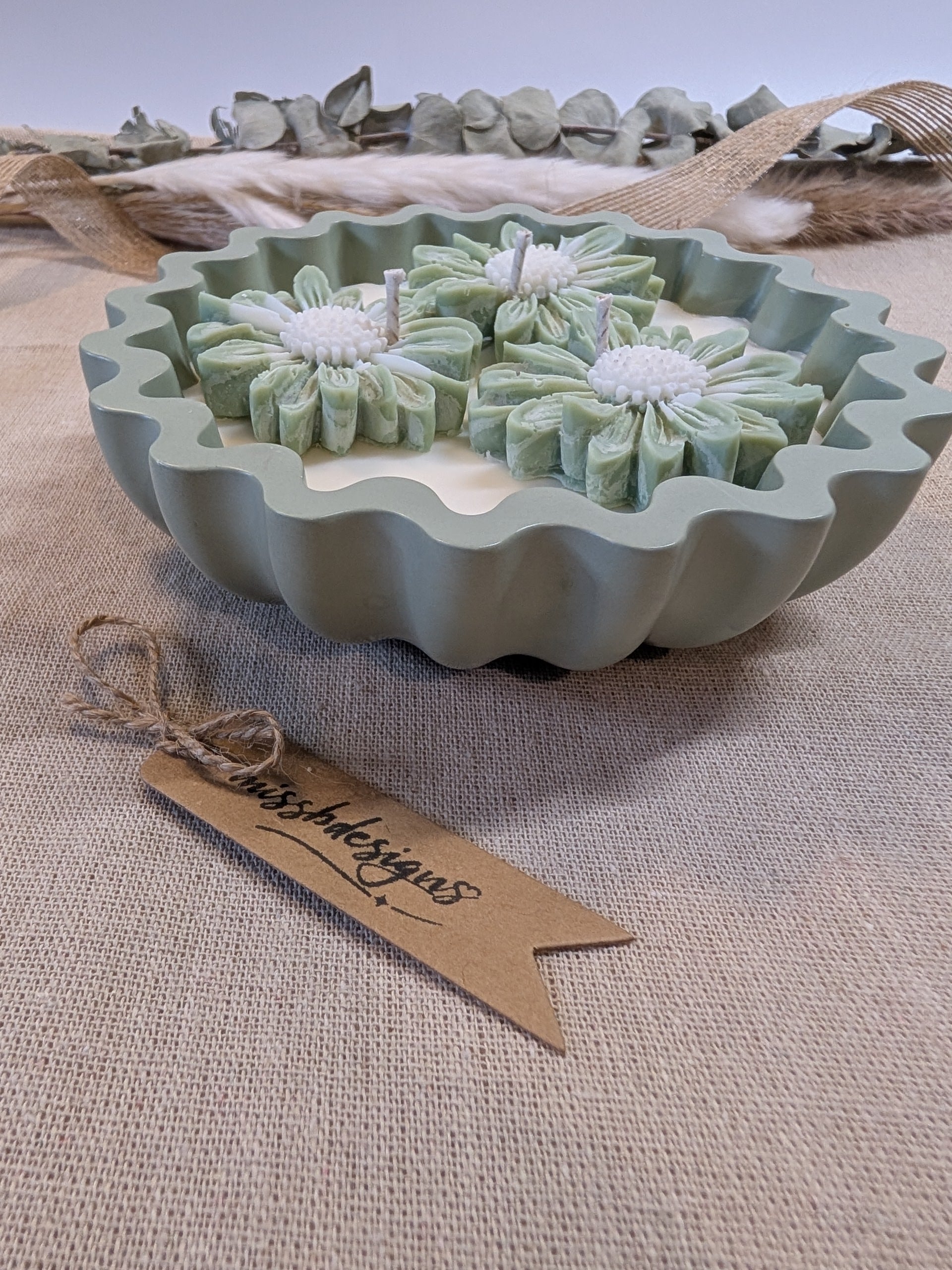 Natural sage green triple daisy candles in neutral green hand cast eco resin home decor pot scented with vanilla perfect gift