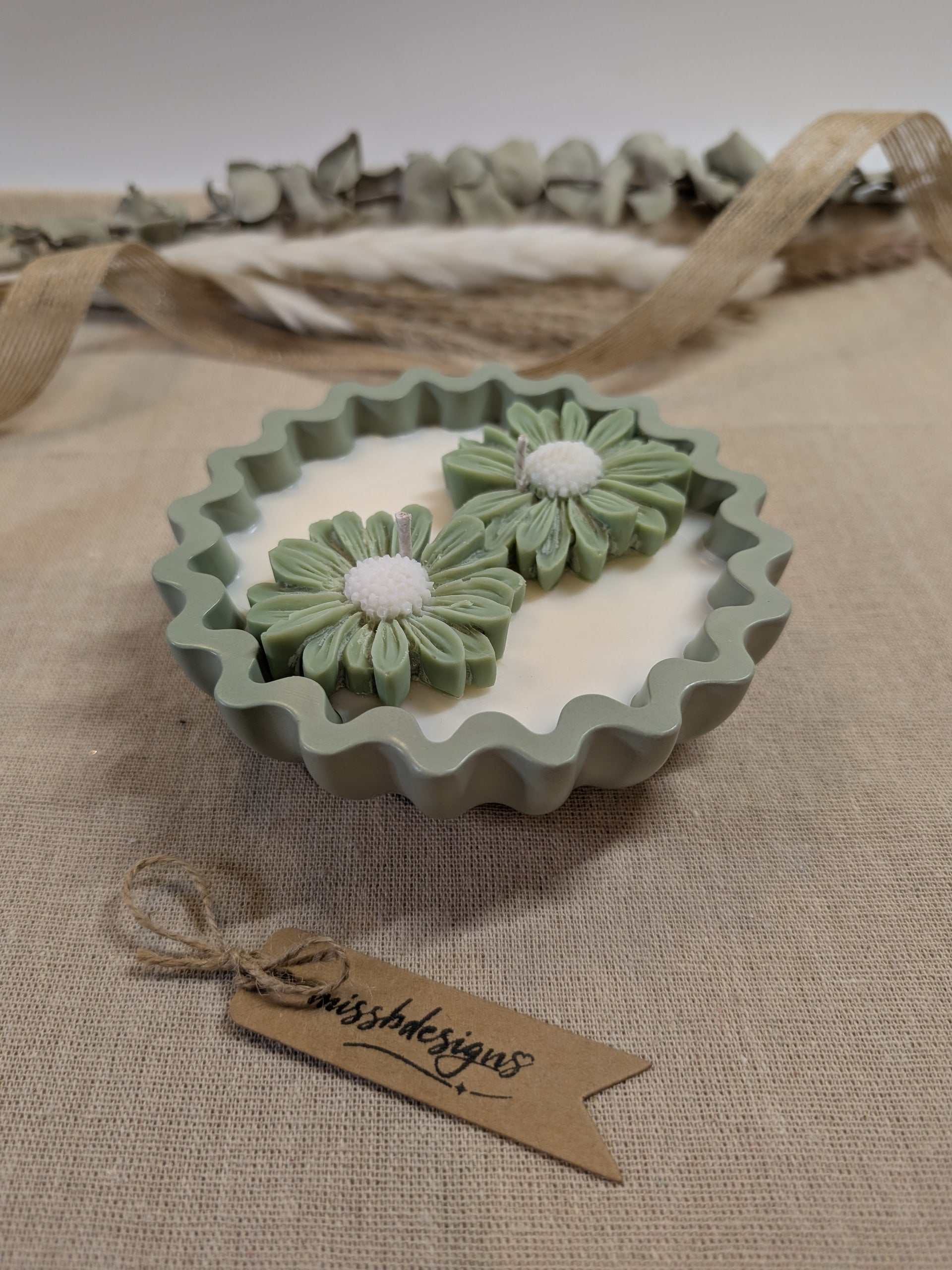 Natural sage green daisy candles in neutral green hand cast eco resin home decor pot scented with vanilla perfect gift