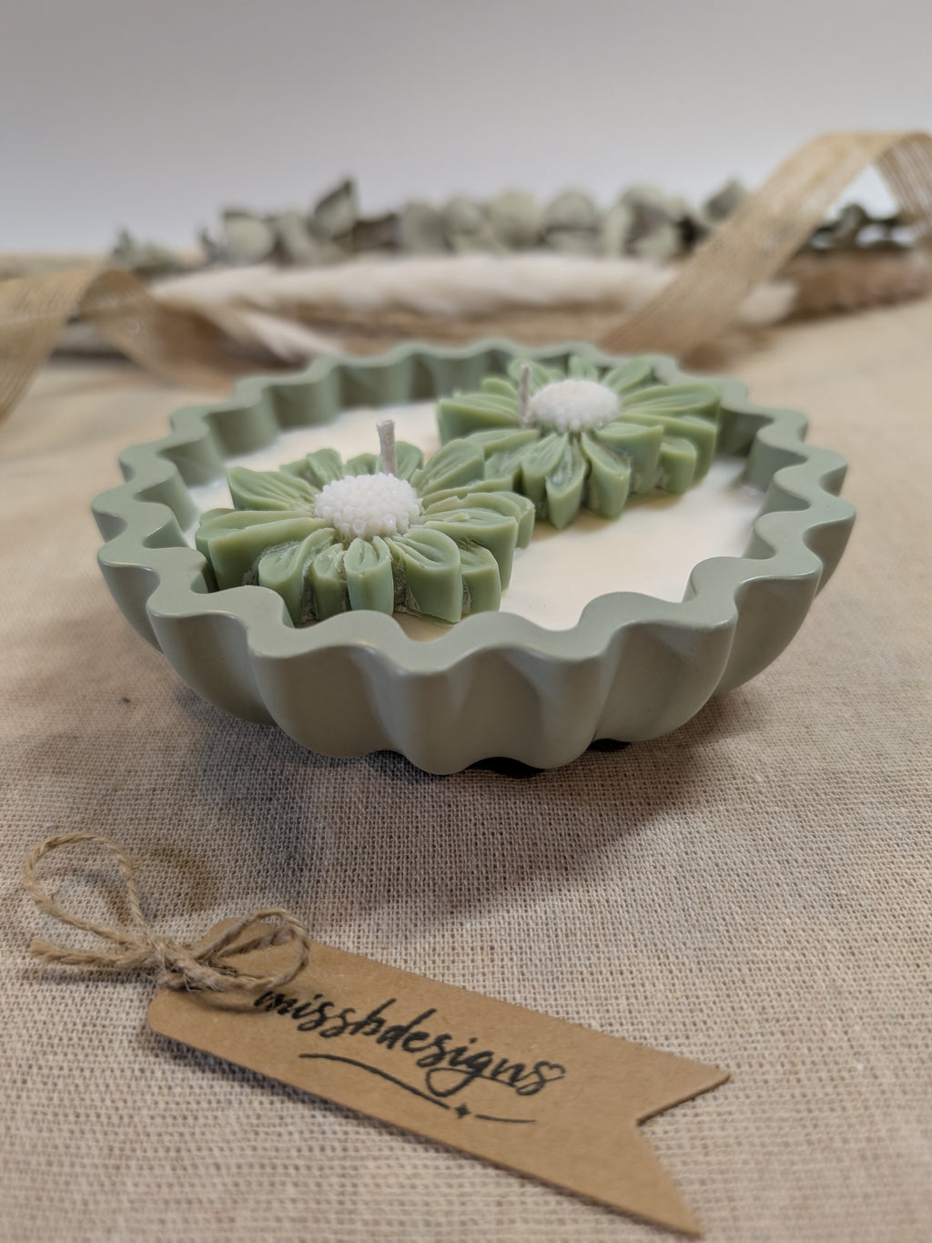 Natural sage green daisy candles in neutral green hand cast eco resin home decor pot scented with vanilla perfect gift