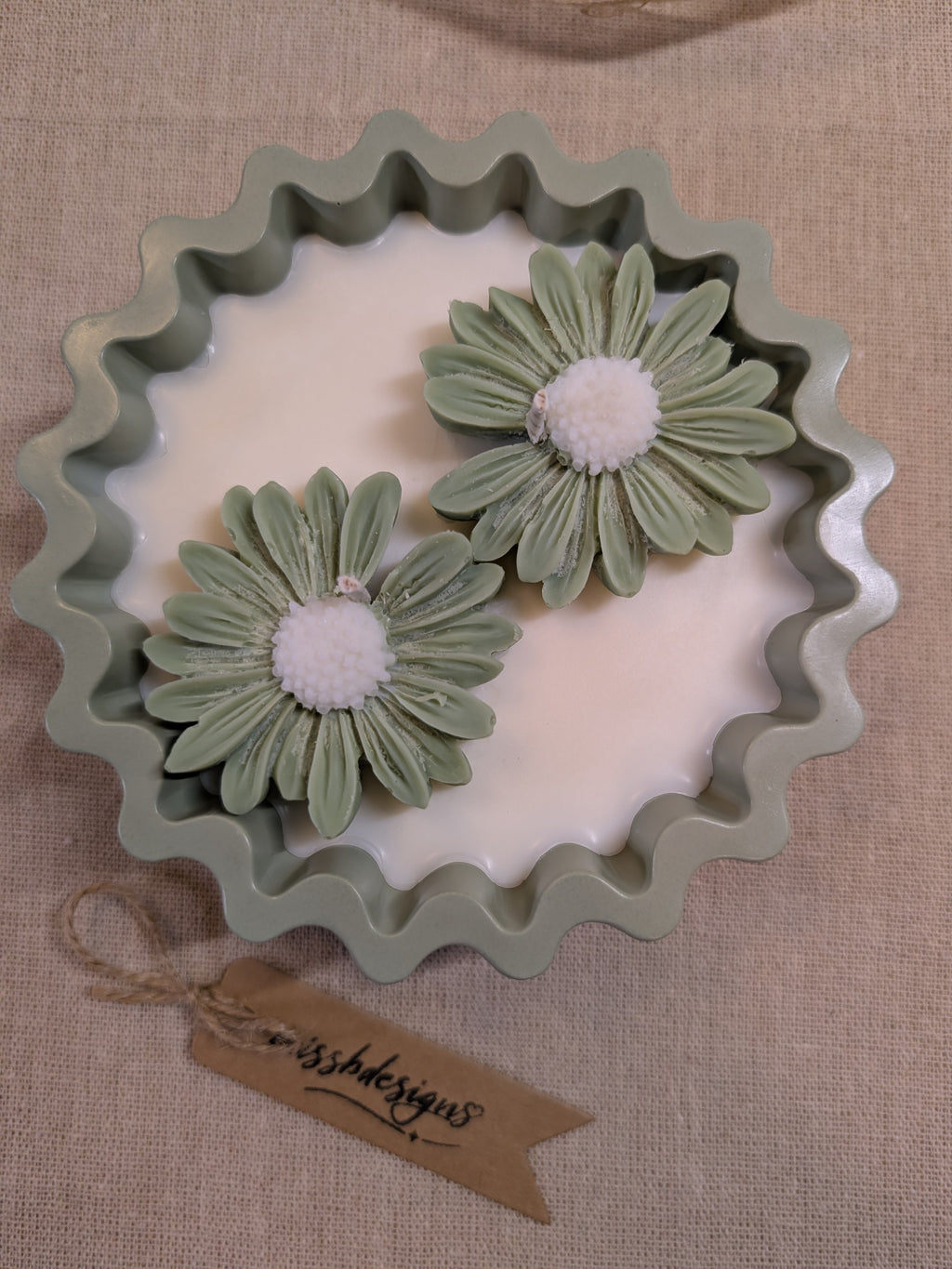Natural sage green daisy candles in neutral green hand cast eco resin home decor pot scented with vanilla perfect gift