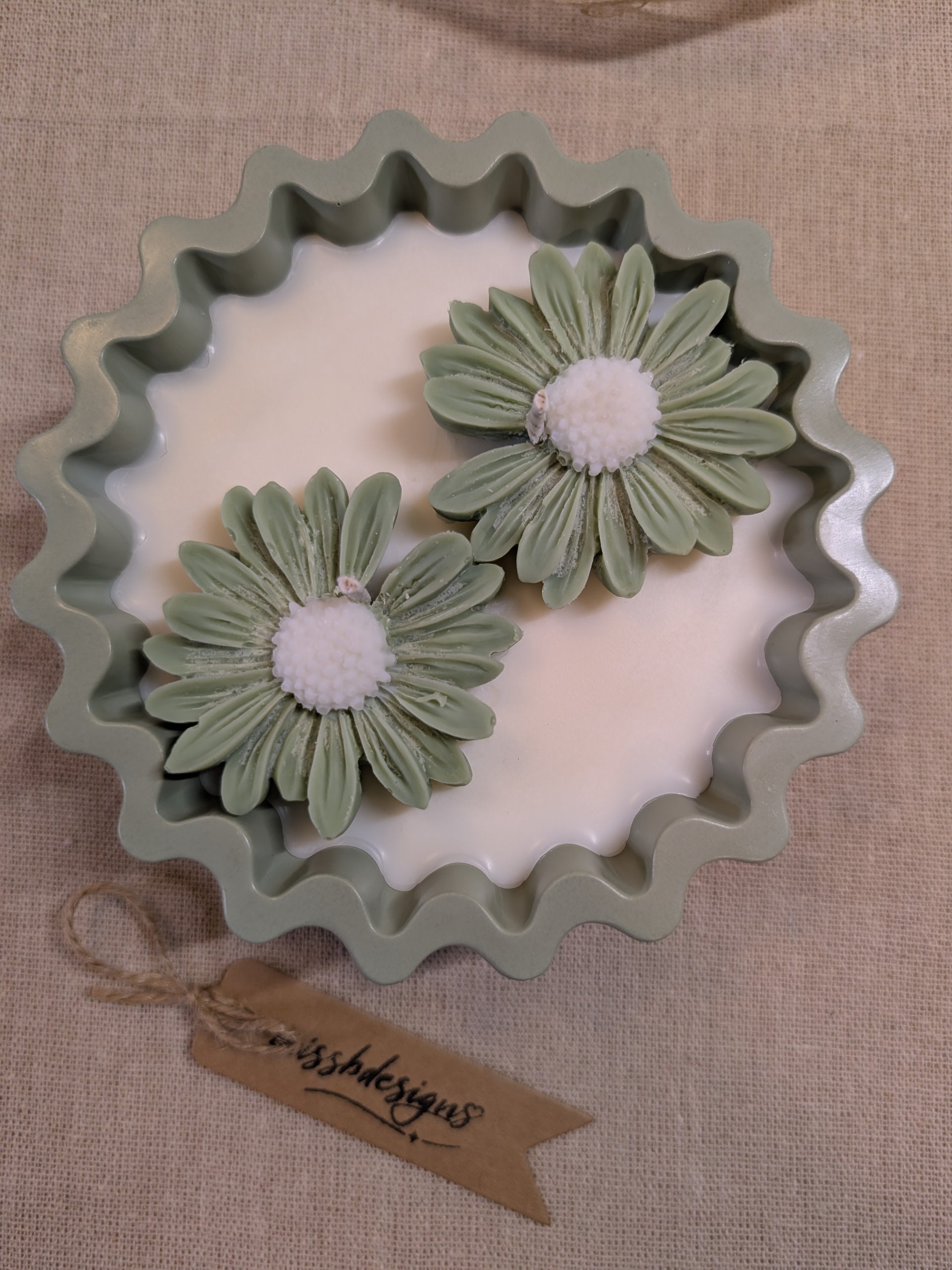 Natural sage green daisy candles in neutral green hand cast eco resin home decor pot scented with vanilla perfect gift