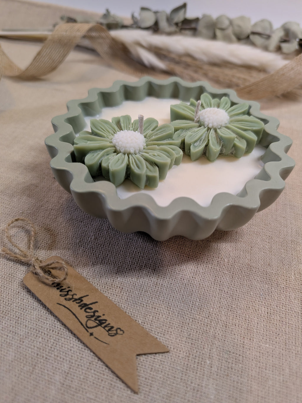 Natural sage green daisy candles in neutral green hand cast eco resin home decor pot scented with vanilla perfect gift