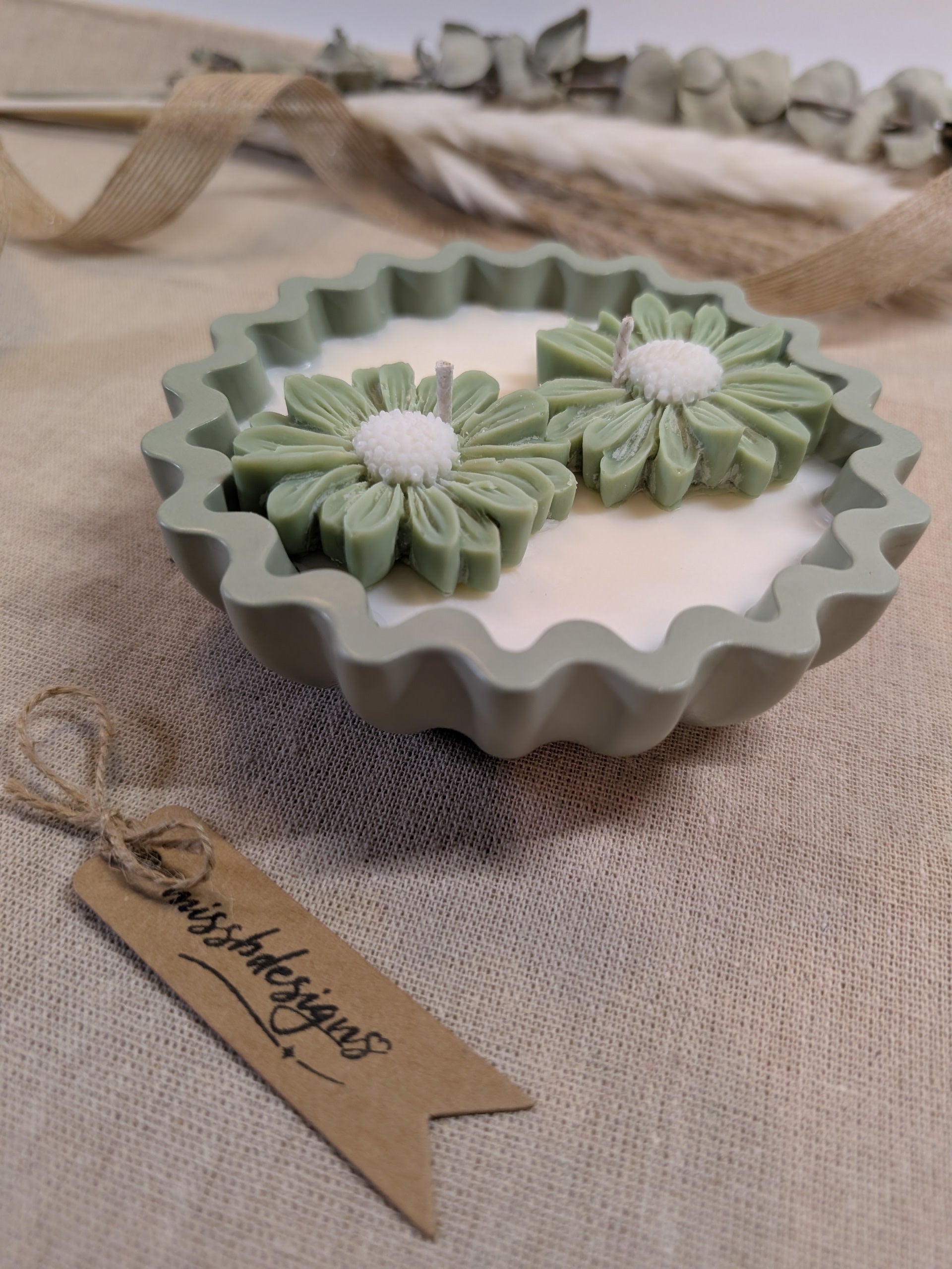 Natural sage green daisy candles in neutral green hand cast eco resin home decor pot scented with vanilla perfect gift