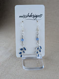 Silver plated sapphire blue resin hand crafted leaf drop earrings