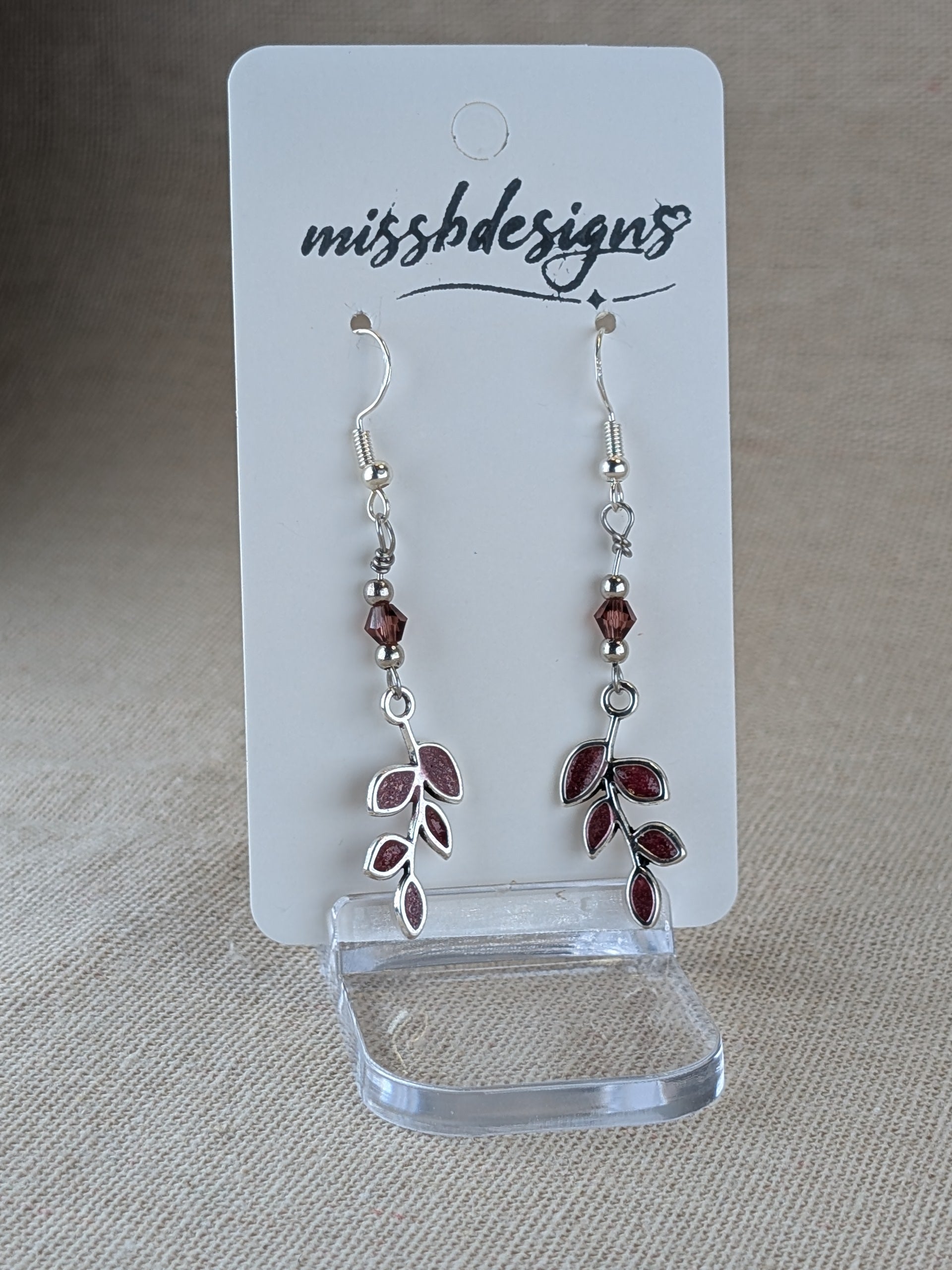 Silver plated claret red resin hand crafted leaf drop earrings