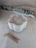 Scented candle in beige marble hand crafted eco resin flower shaped container perfect gift