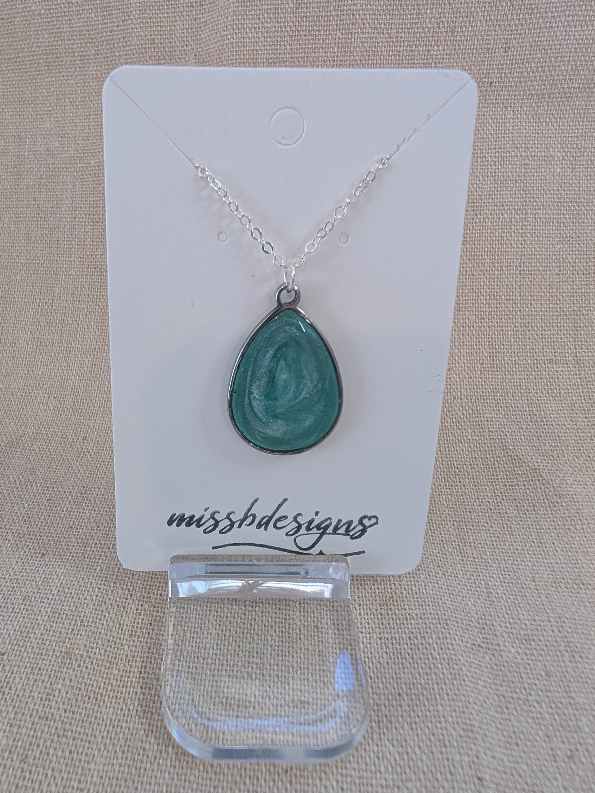 Teardrop pendant necklace with green resin centre in silver chain gift