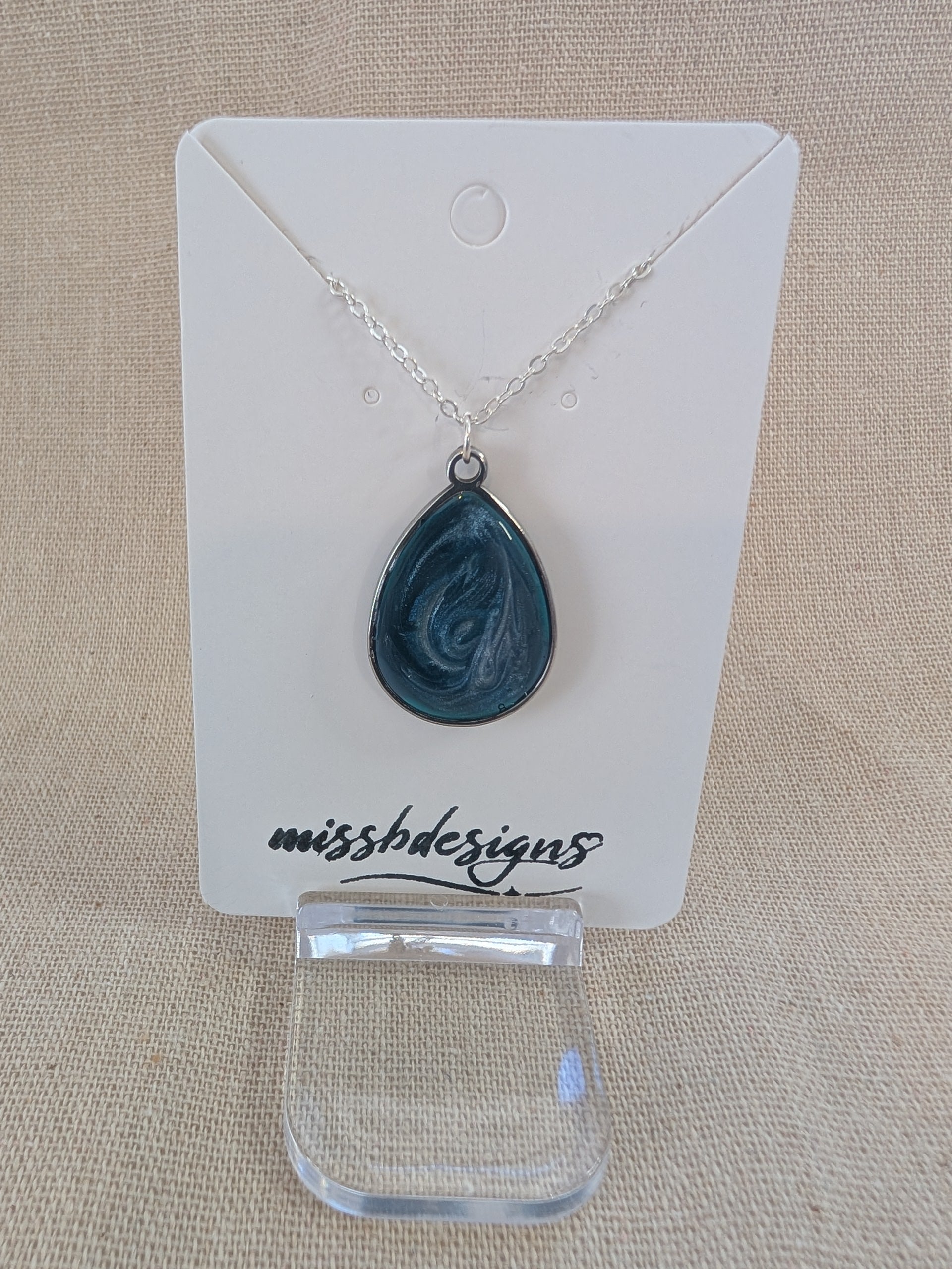 Teardrop pendant necklace with green resin centre in silver chain gift