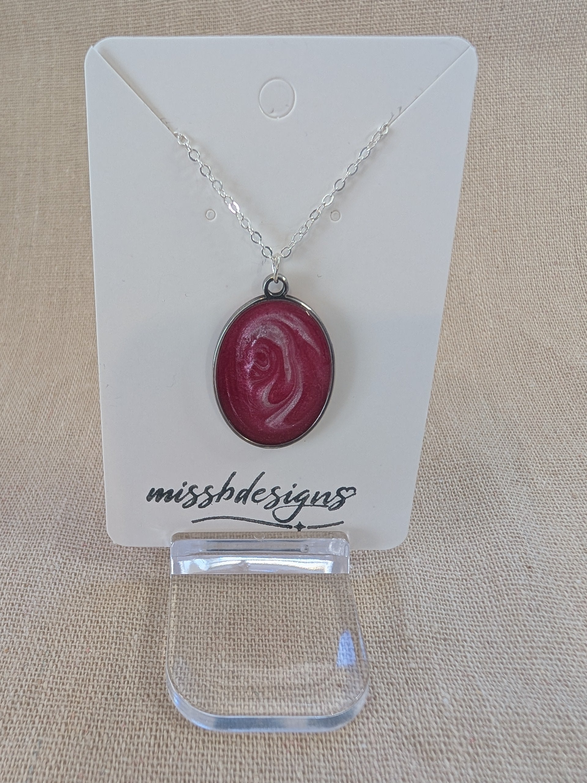 Necklace with a pink red resin  pendant on silver chain handcrafted