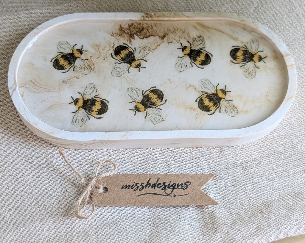 Bumblebee Trinket tray made from beige marble neutral eco resin jesmonite with bee images and epoxy resin seal for the perfect gift